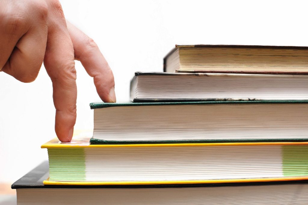 Ed 6 Article 3 - fingers walking up books Ed 6 Article 3 - fingers walking up books